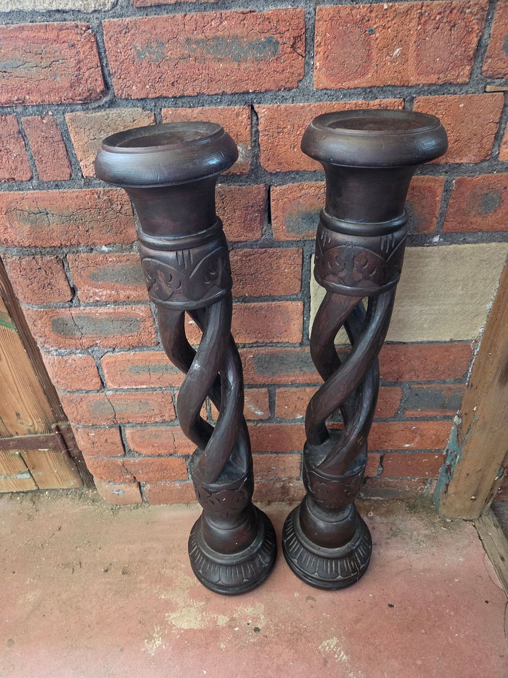 Lot 344 – A Pair of Carved Wood Barley-Twist Floor-Standing Pricket Candle Holders