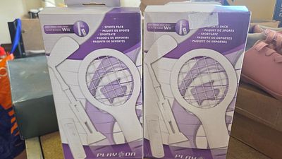 A Pair of Play On Sports Pack Accessory Kits for Nintendo Wii