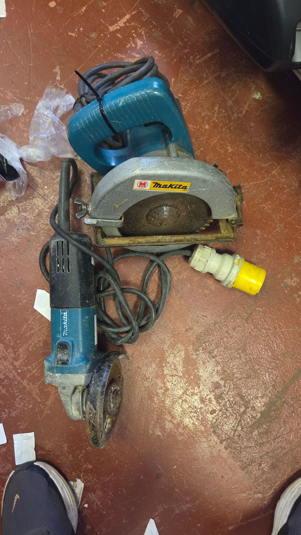 Lot 217 – Two Makita 110V Corded Power Tools comprising a Circular Saw and Angle Grinder