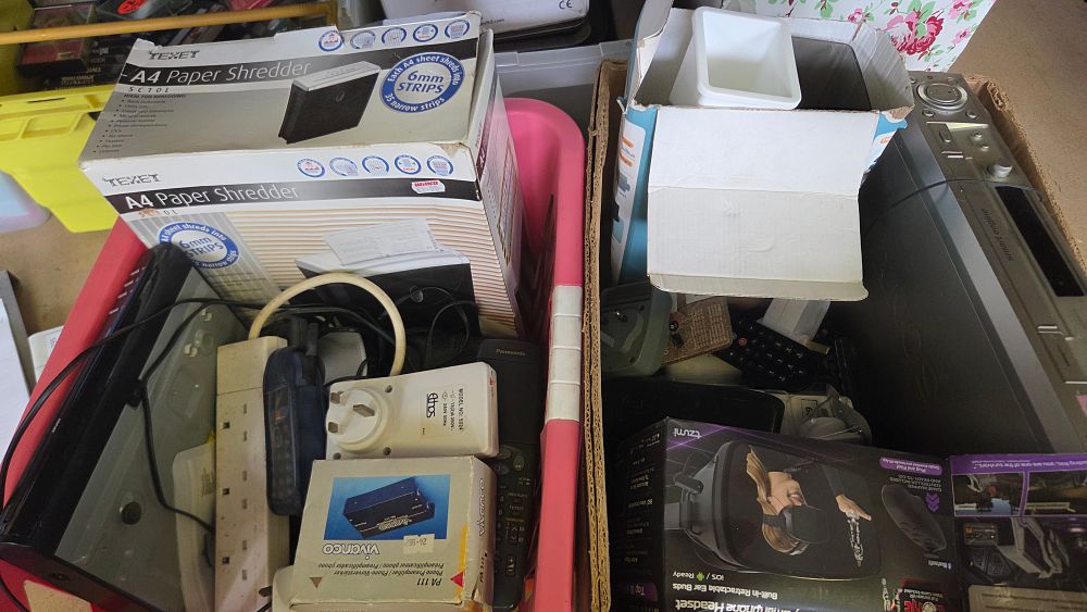 Lot 291 – Two boxes of Consumer Electronics and Accessories Including a Texet Paper Shredder and Tzumi VR Headset