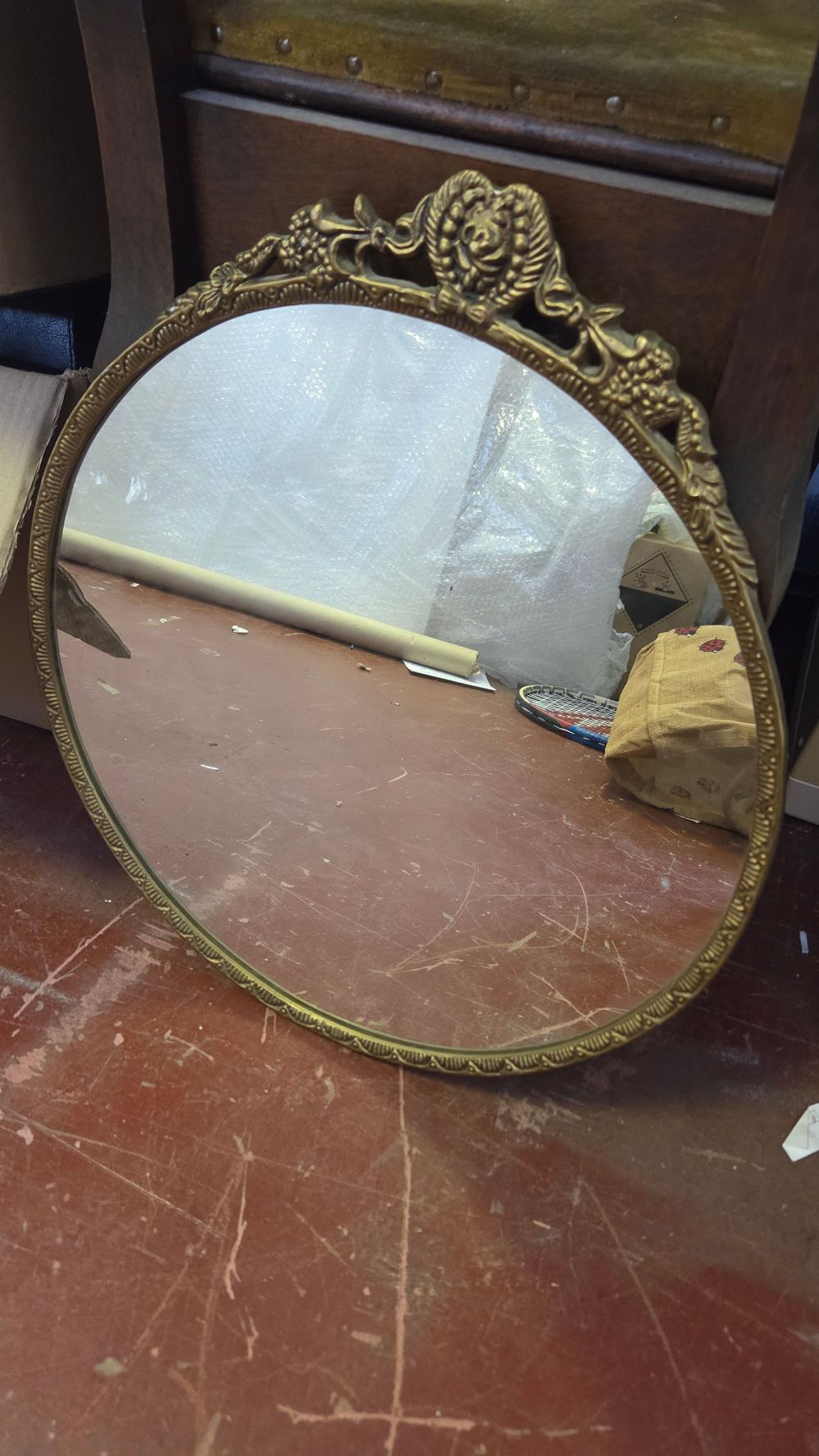 Lot 348 – A Vintage Gilded Cast Metal Oval Wall Mirror in the Rococo Revival Style