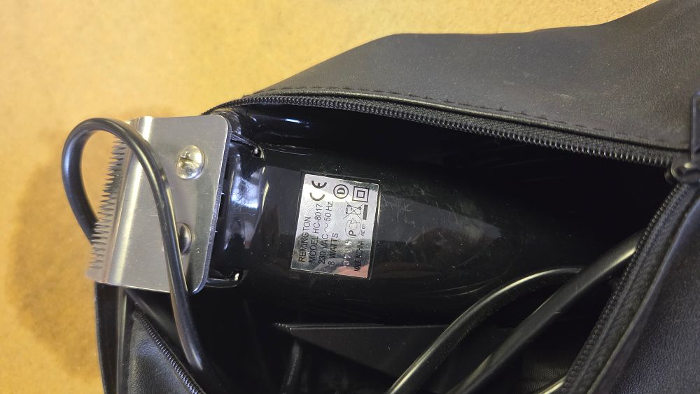 Lot 353 – Remington Model HC-8017 Corded Electric Hair Clipper with Storage Pouch