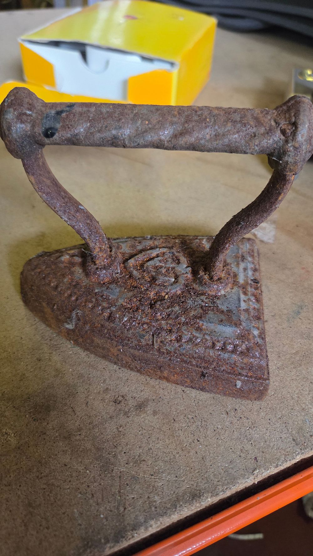 Lot 376 – Antique Cast Iron Sad Iron with Stylised Embossed Marking