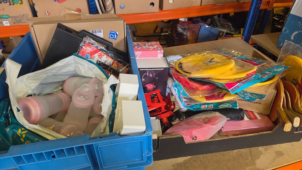 Lot 273 – Two Boxes of General Merchandise including Baby Feeding Bottles, Electronics Accessories, and Textiles