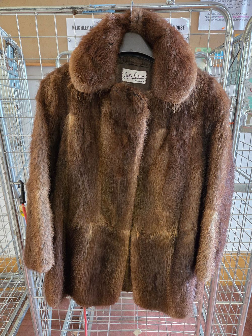Lot 426 – A mid-20th-century ladies’ brown fur coat by John Logan of Glasgow