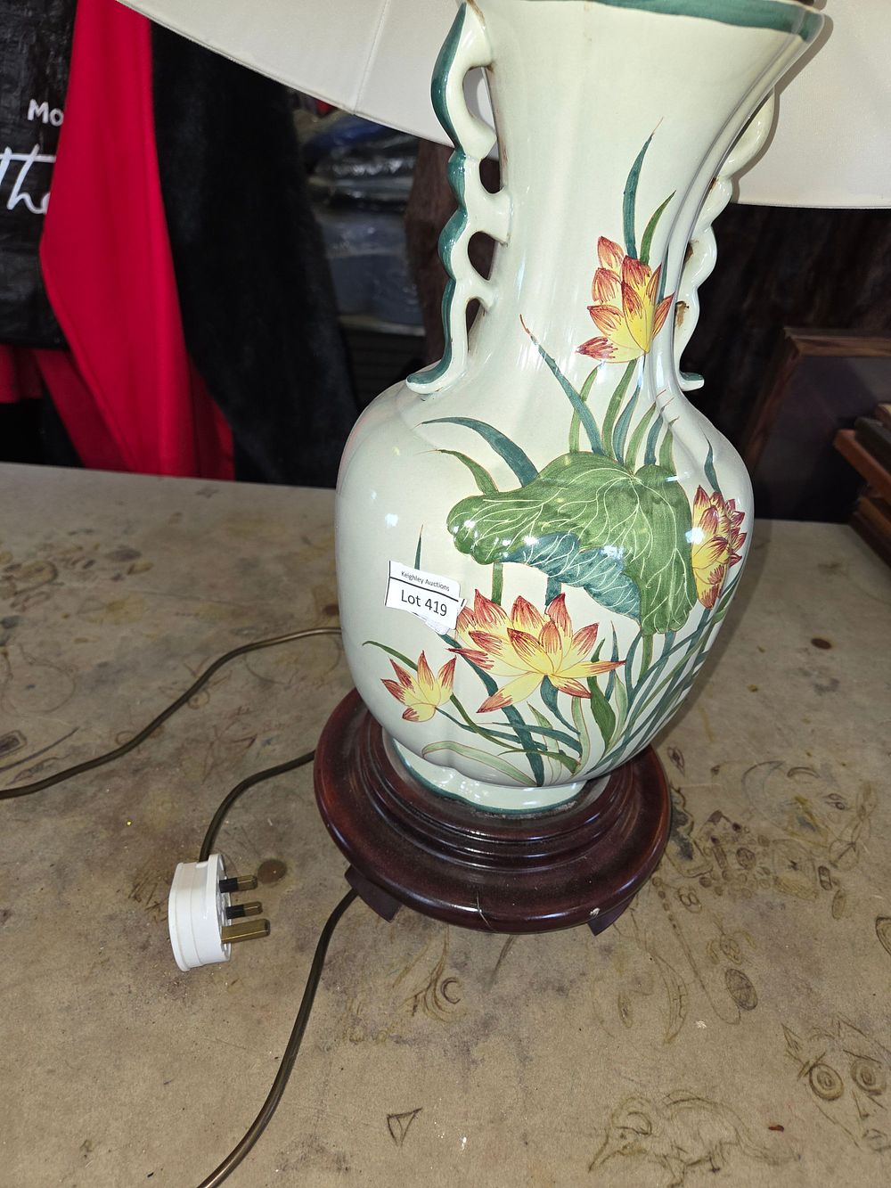 Lot 436 – A Chinese style ceramic table lamp with lotus flower decoration
