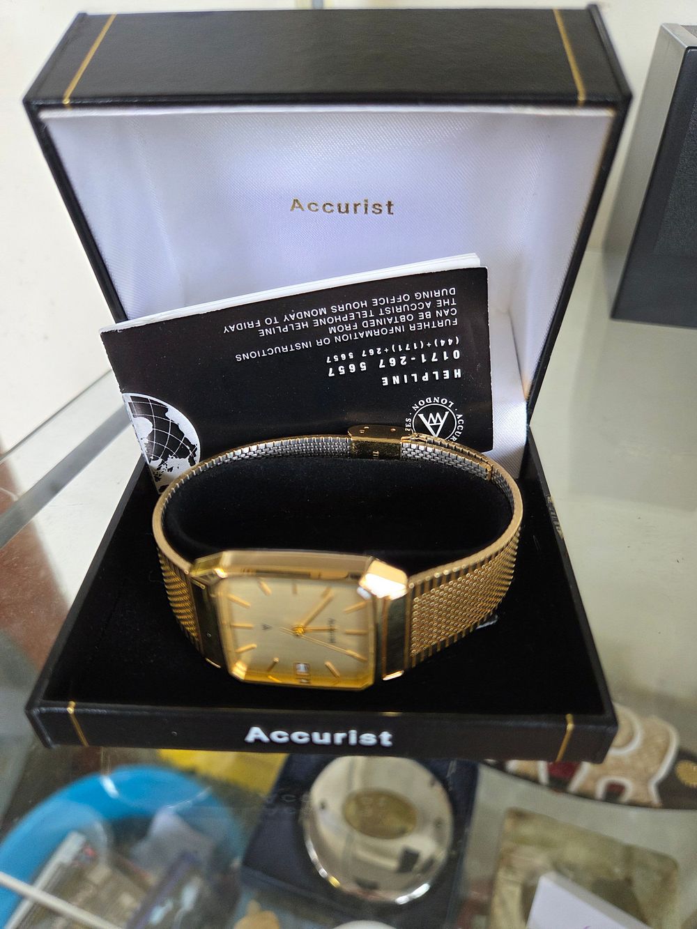 Lot 600 – Accurist Vintage Gold-Tone Rectangular Quartz Wristwatch with Box and Papers
