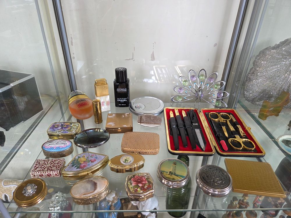 Lot 607 – A Collection of Vintage Vanity Accessories, Designer Perfumes, and Compacts
