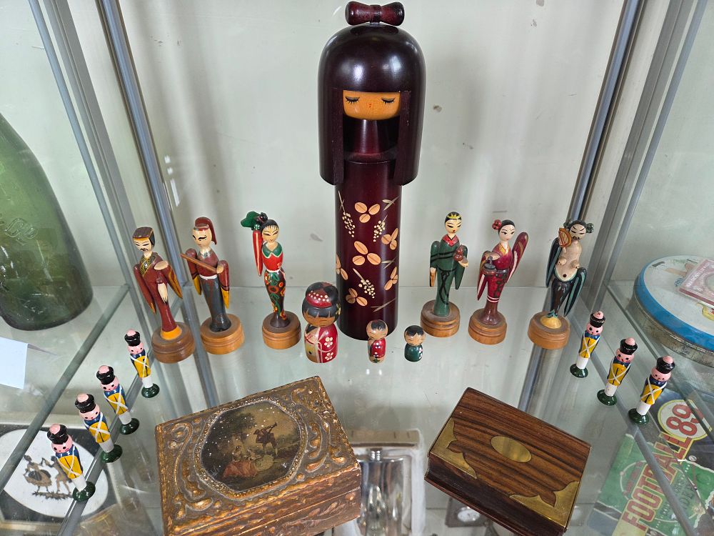 Lot 615 – A Group of Japanese Wooden Kokeshi Dolls and Two Decorative Boxes