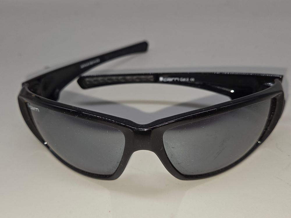 Lot 603 – A pair of Cairn black wrap-around sports sunglasses
