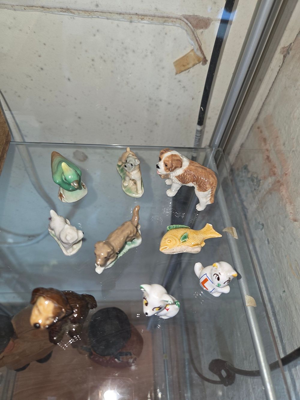Lot 626 – An Assortment of Miniature Glazed Ceramic Animal Figurines in the Style of Wade