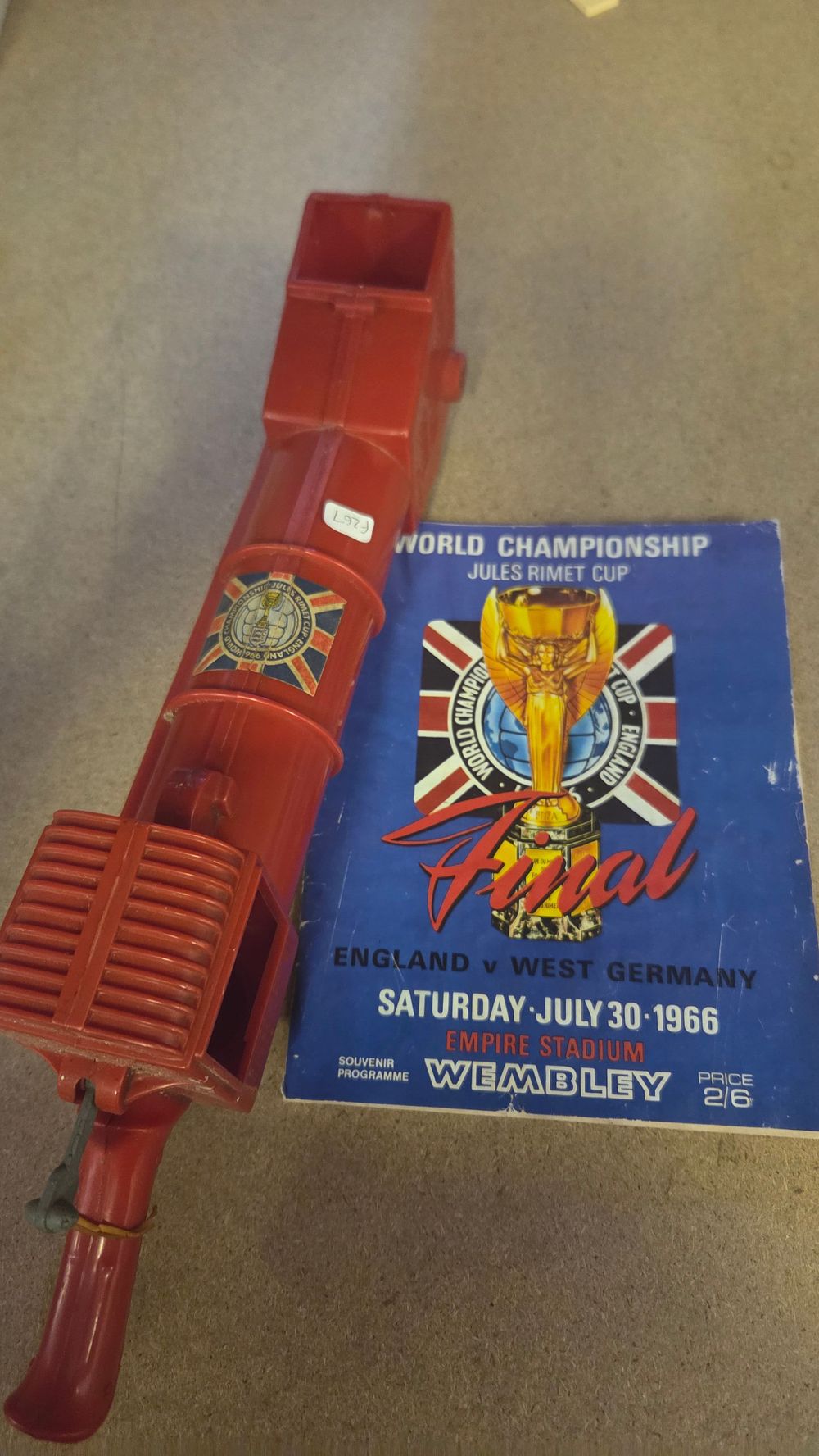 Lot 183 – Two 1966 FIFA World Cup Souvenirs Comprising a Final Programme and a Marx Sooper Snooper 4-Way Scope