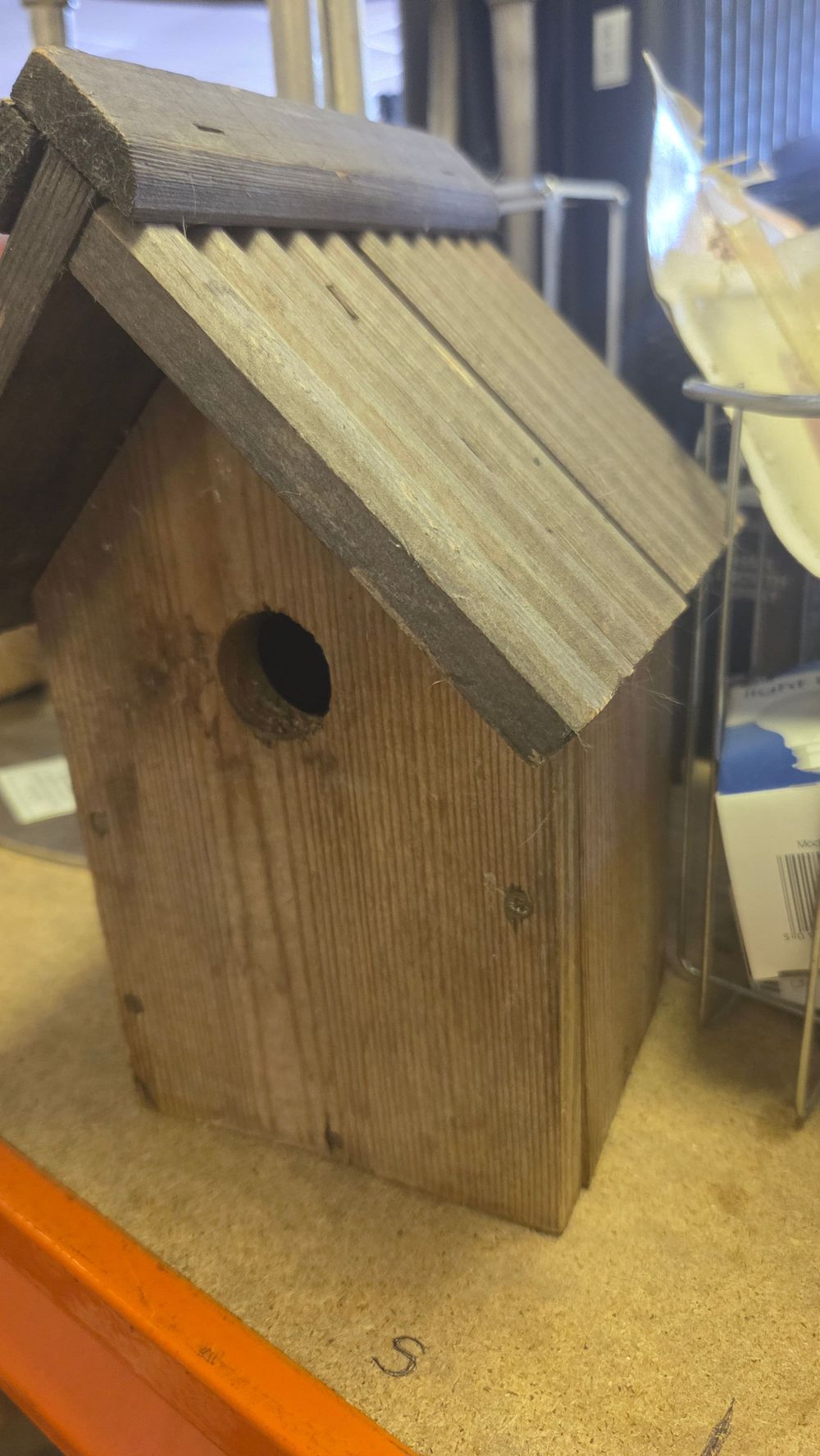 Lot 207 – A Rustic Weathered Wood Birdhouse