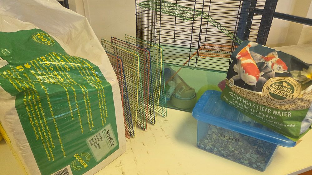 Lot 235 – An Assortment of Small Pet and Aquatic Supplies including a Multi-Level Habitat and Bedding