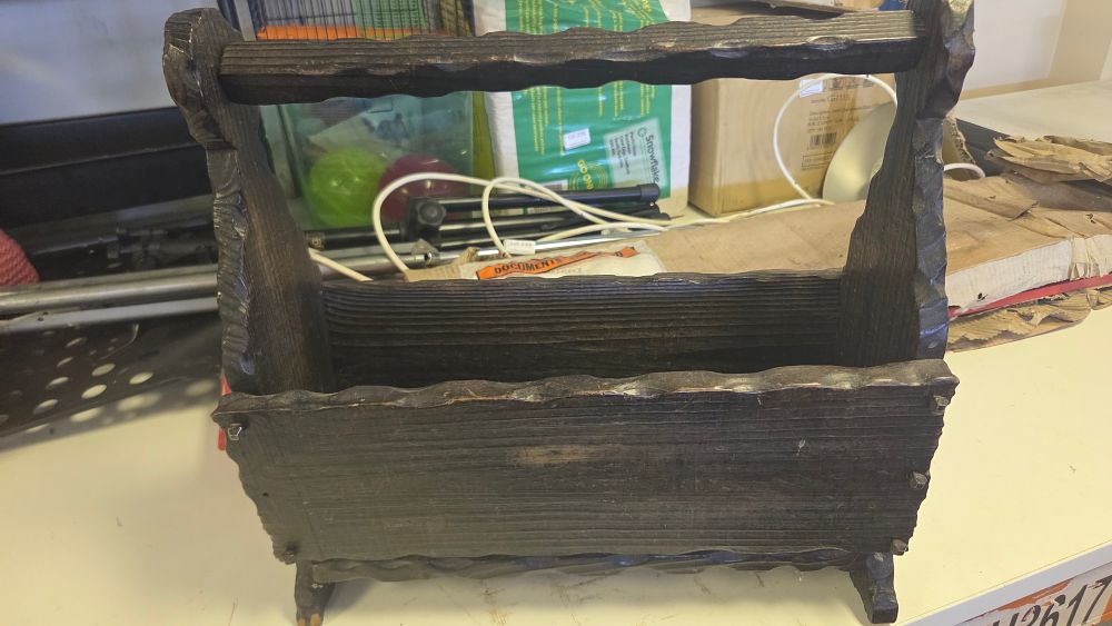 Lot 241 – Mid-20th Century Carved Dark Oak Magazine Rack in the Spanish Style