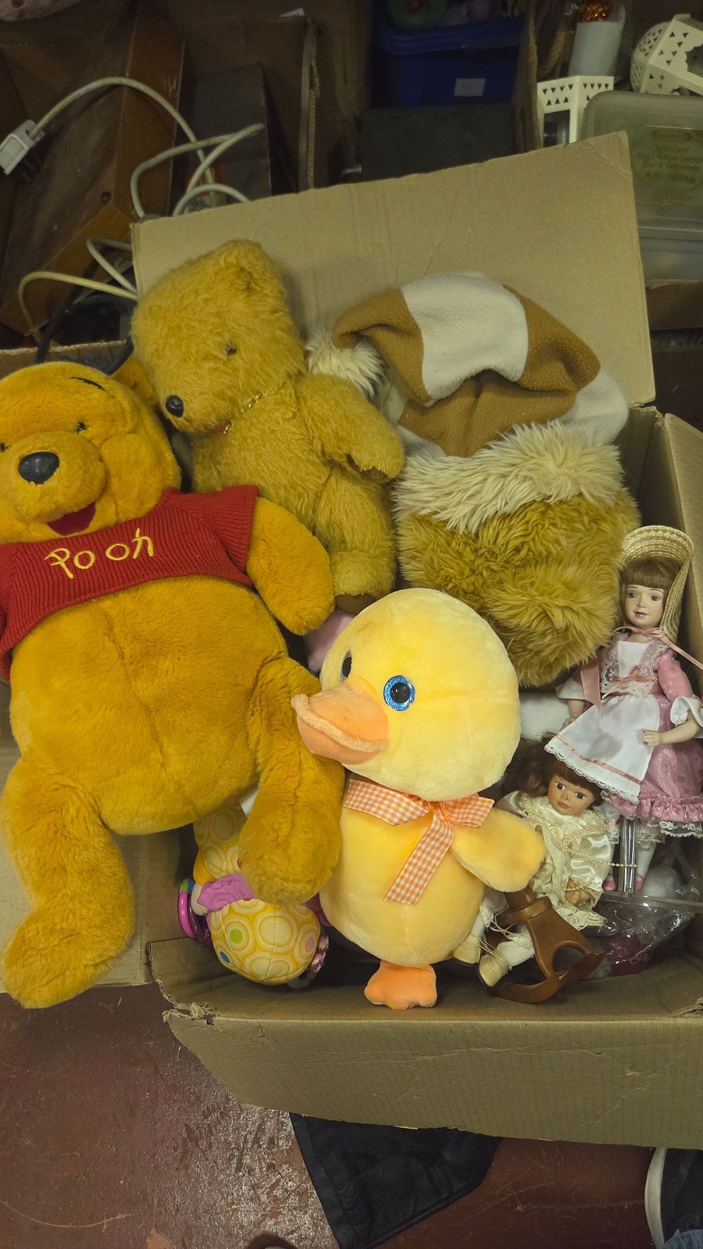 Lot 243 – A Collection of Vintage and Modern Plush Toys and Porcelain Dolls including Winnie the Pooh