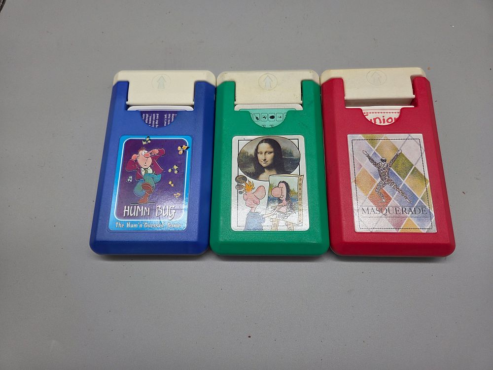 Lot 155 – Three Vintage The Games Team Handheld Mini Games