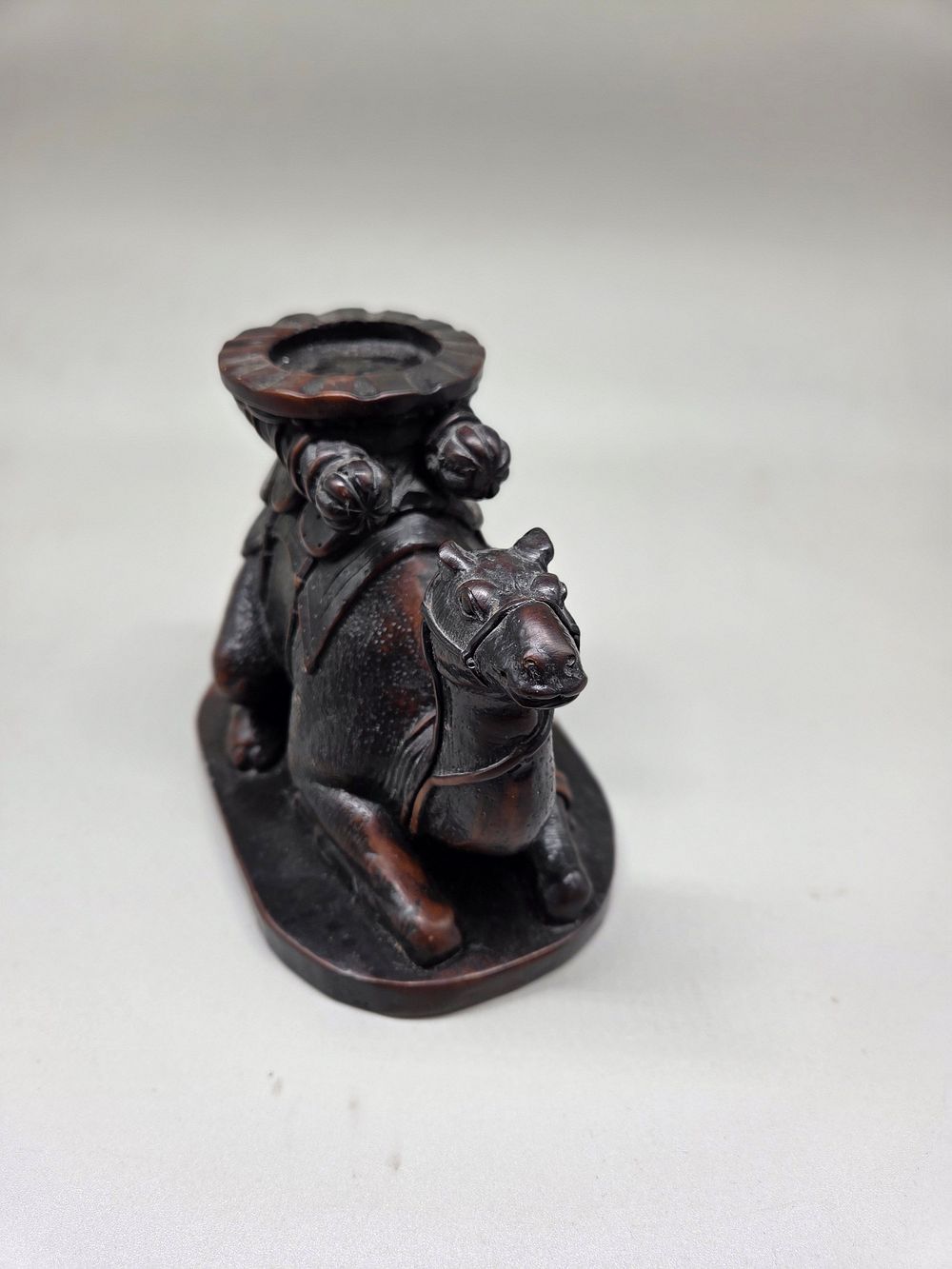 Lot 232 – A Japanese carved hardwood Camel