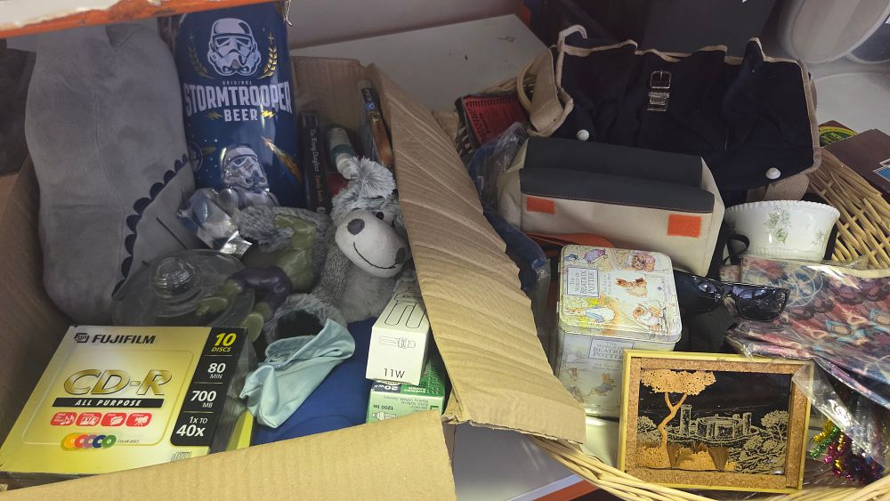 Lot 251 – Box and Wicker Basket of Miscellaneous Collectables, Media, and Household Goods
