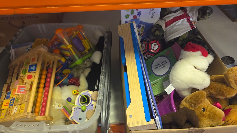 Lot 332 – Two Boxes of Children’s Soft Toys, Books, and Wooden Educational Items