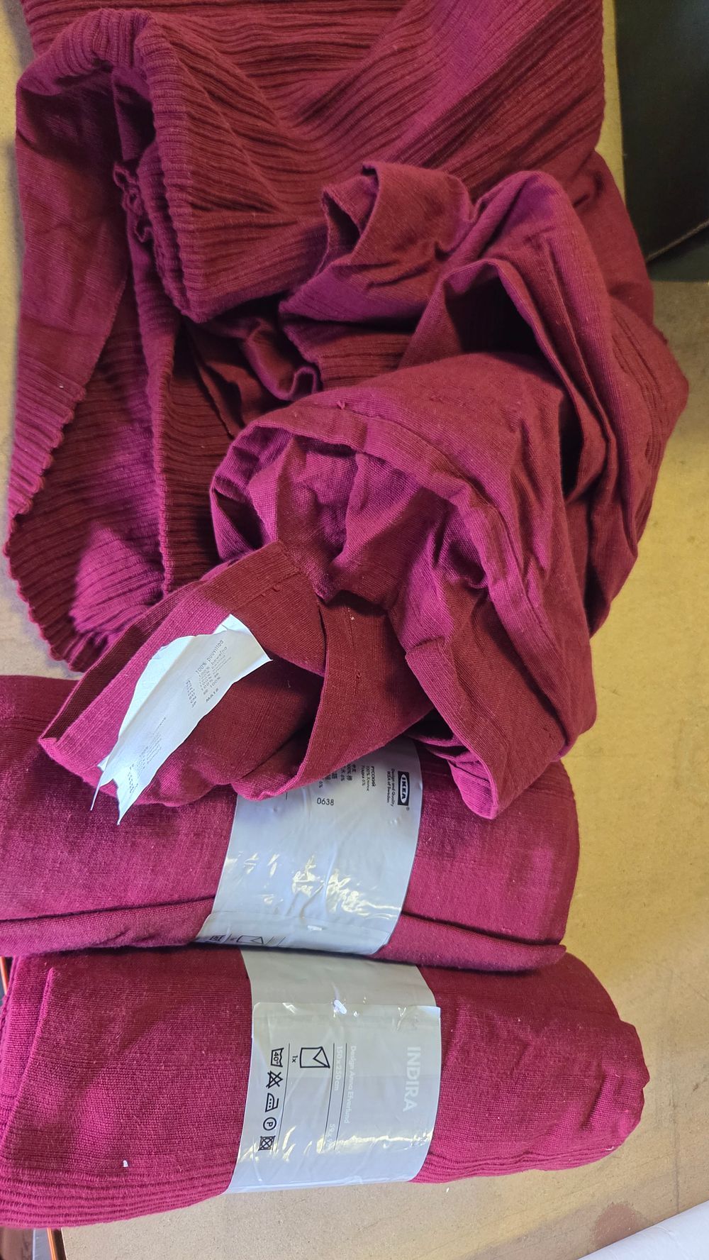 Lot 312 – Three IKEA INDIRA Burgundy Cotton Bedspreads
