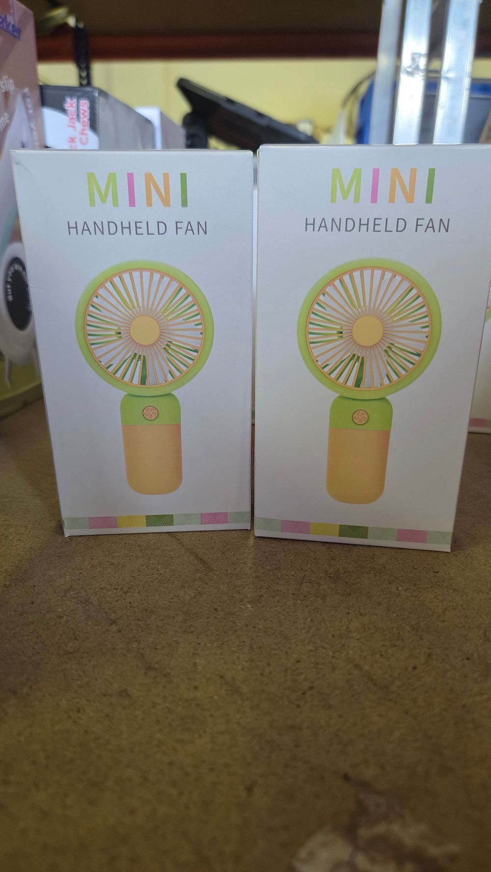 Lot 328 – A Pair of Portable Mini Handheld Rechargeable Fans in Original Packaging