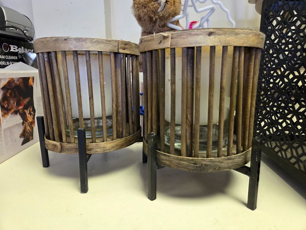 Lot 374 – A Pair of Rustic Wooden Slat Candle Lanterns on Metal Stands