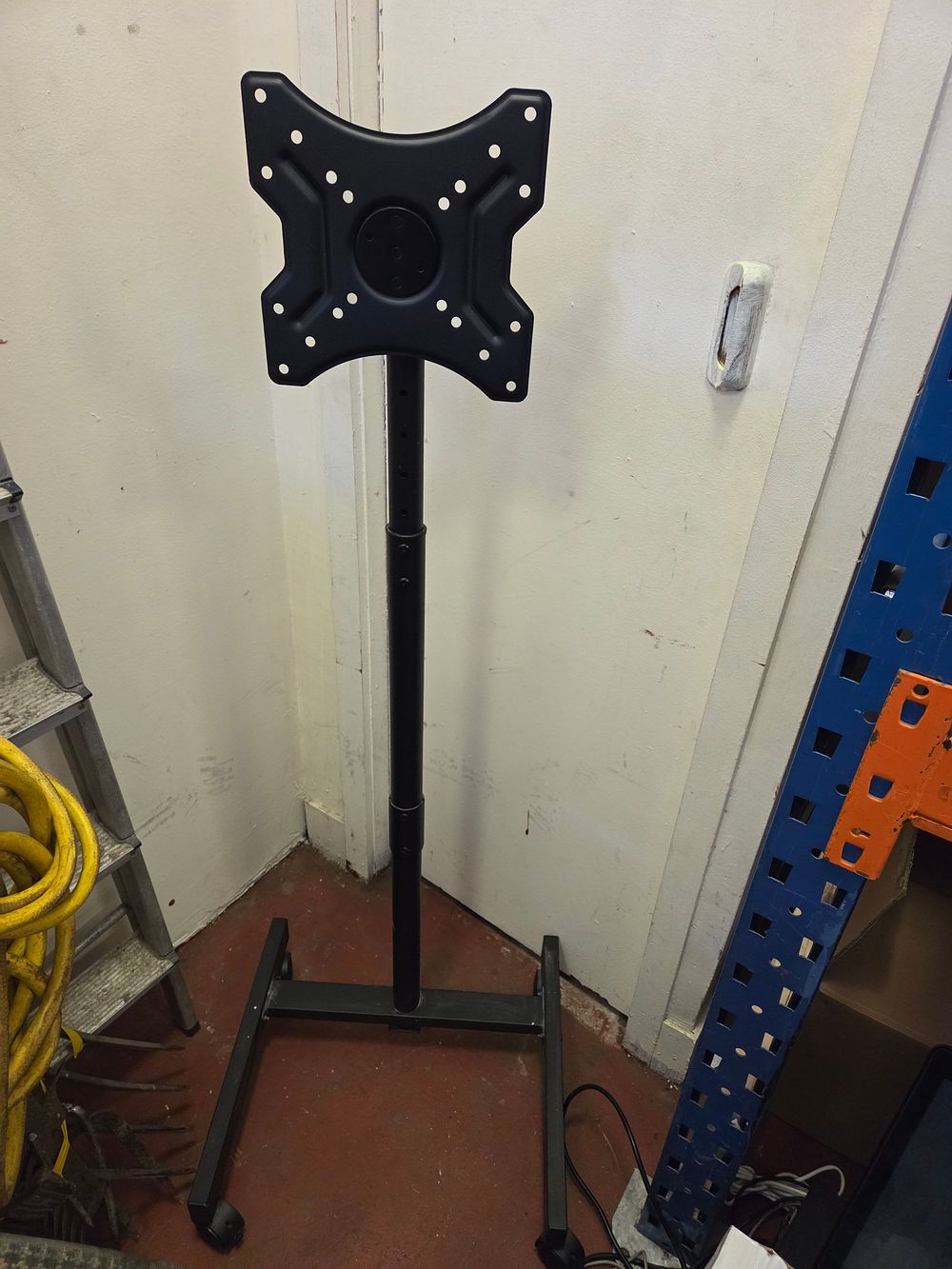 Lot 401 – A Mobile Height-Adjustable Television and Monitor Floor Stand
