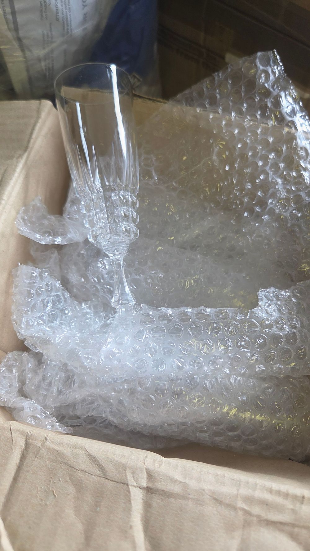 Lot 428 – Box of Cut Lead Crystal Champagne Flutes with Diamond and Mitre Cutting