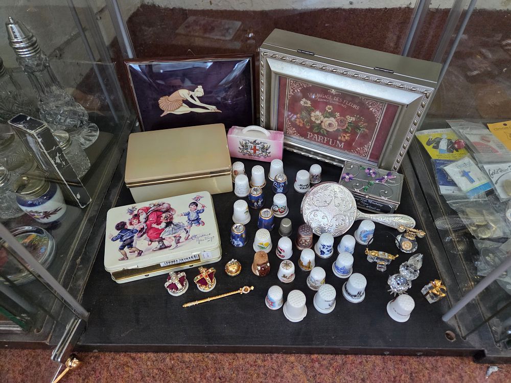 Lot 609 – A Collection of Decorative Objects including Thimbles, Trinket Boxes, and a Handheld Mirror