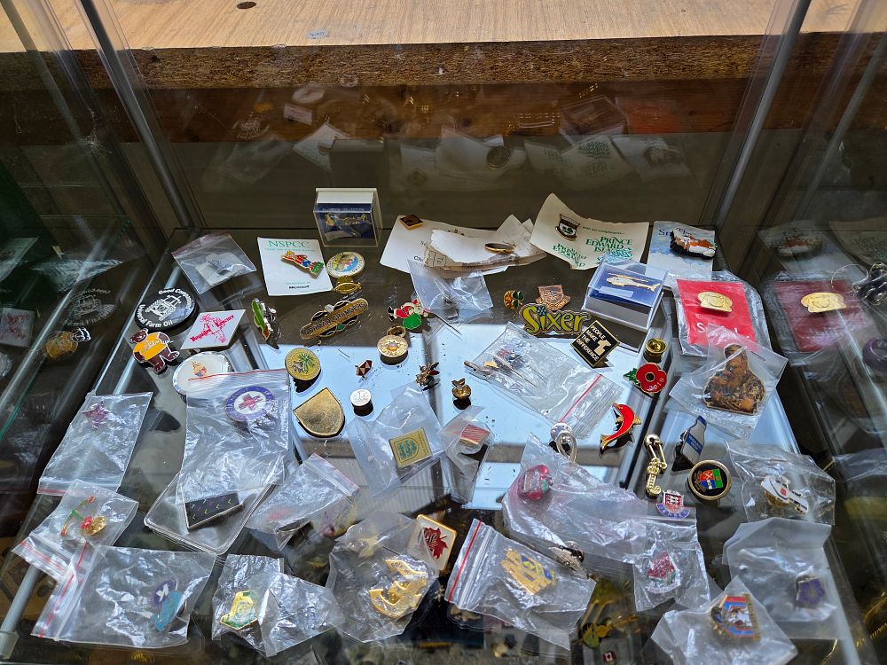Lot 611 – An Assortment of Vintage and Contemporary Enamel Lapel Pins and Badges