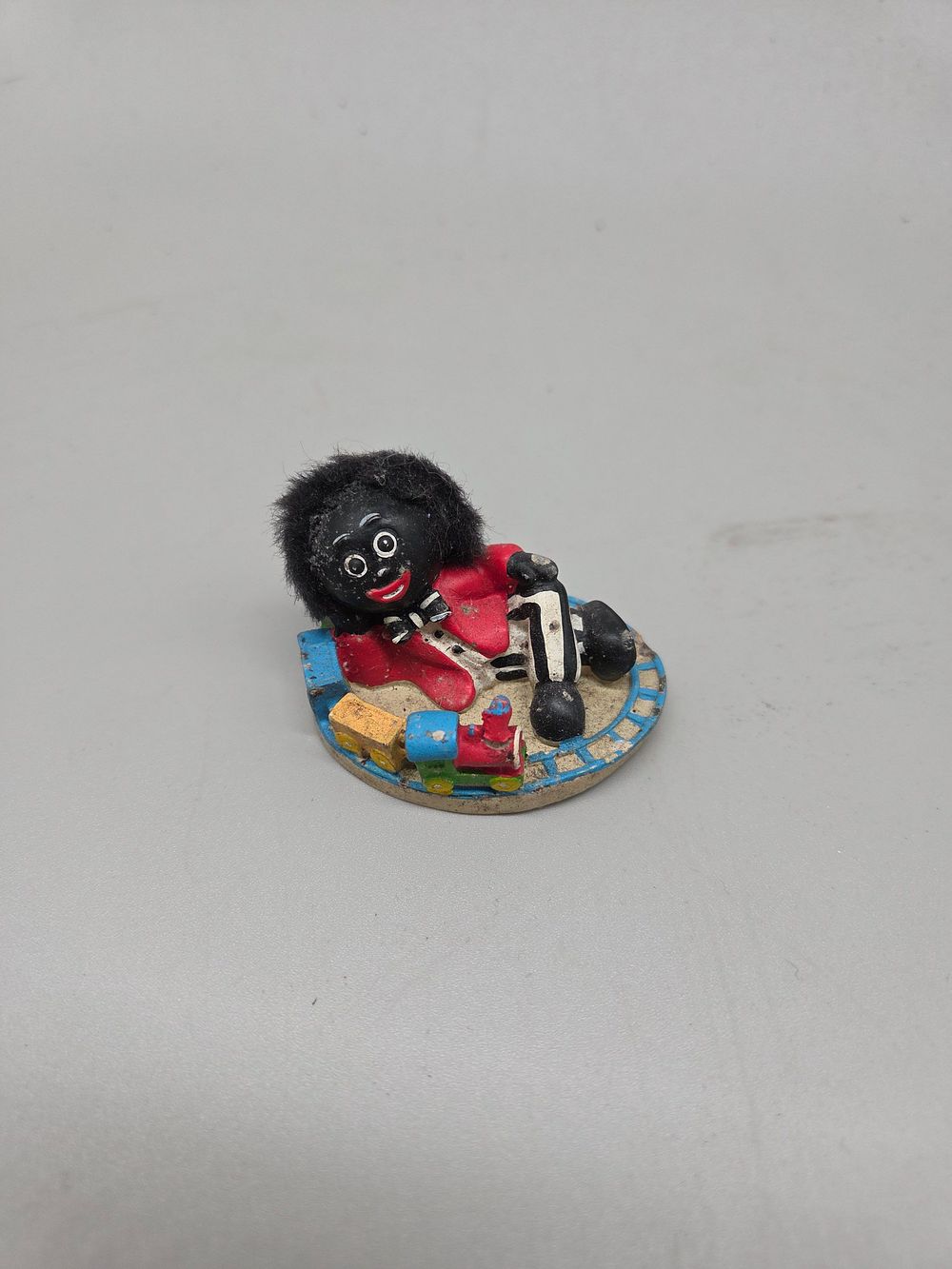 Lot 616 – A vintage painted plaster Golly character figurine in the style of Robertson advertising merchandise