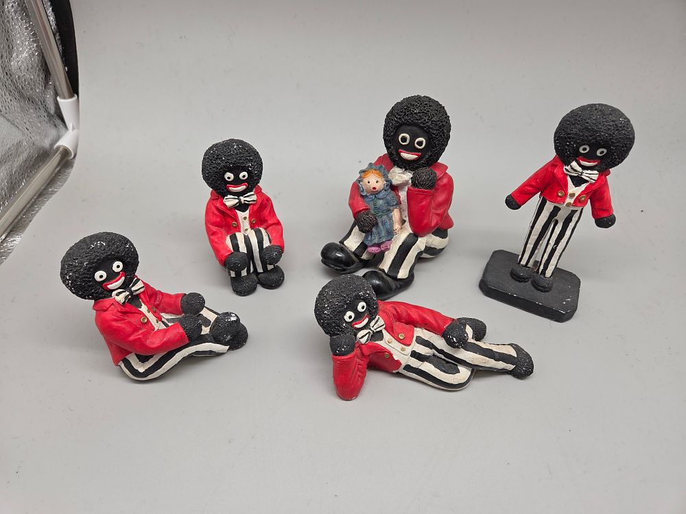 Lot 623 – A collection of resin Golly themed figurines