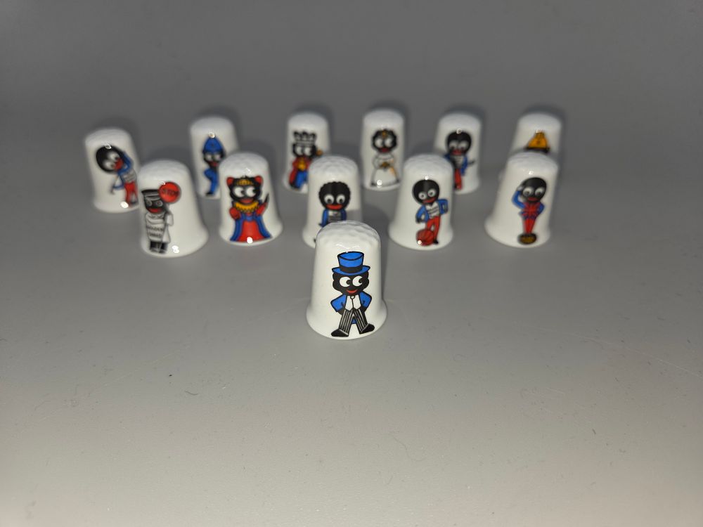 Lot 631 – A Collection of Robertson’s Golden Shred Promotional Golly Thimbles