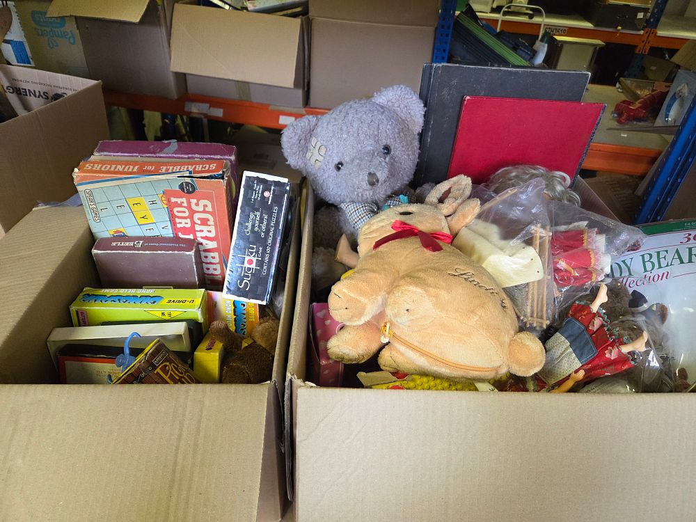 Lot 234 – Two Boxes of Vintage Board Games, Plush Toys, and Ephemera