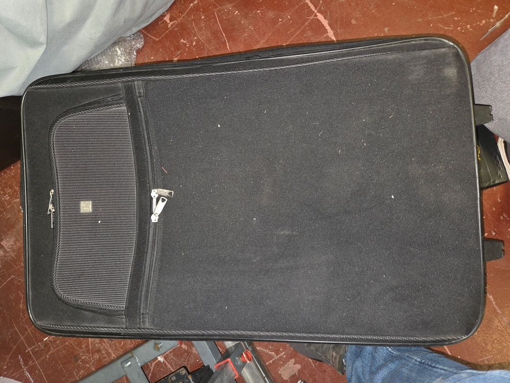 Lot 299 – Large Black Soft-Side Upright Suitcase with Two Wheels