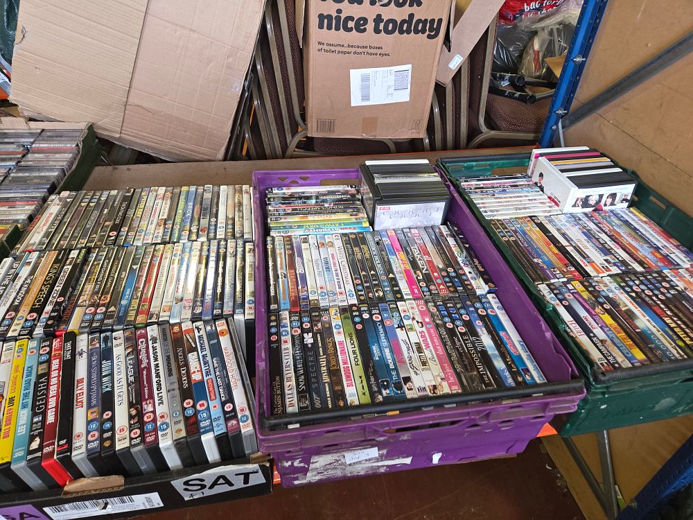 Lot 305 – An Assortment of DVDs and Television Series Housed in Three Containers