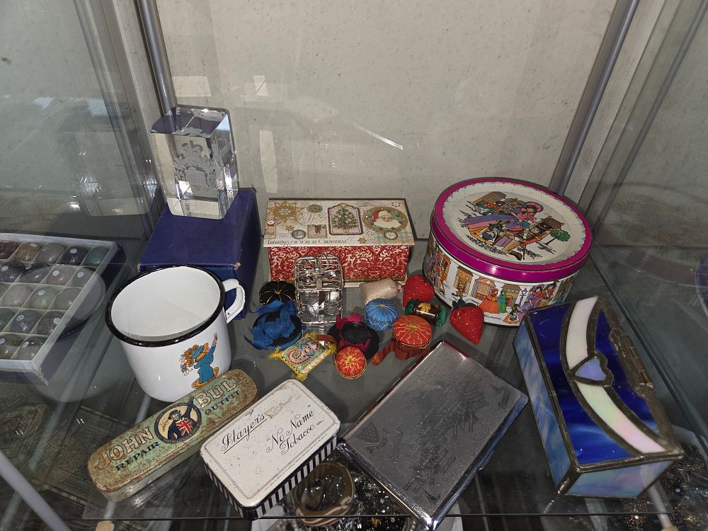 Lot 616 – An Assortment of Vintage Collectibles Including Advertising Tins, Decorative Boxes, and Domestic Objects