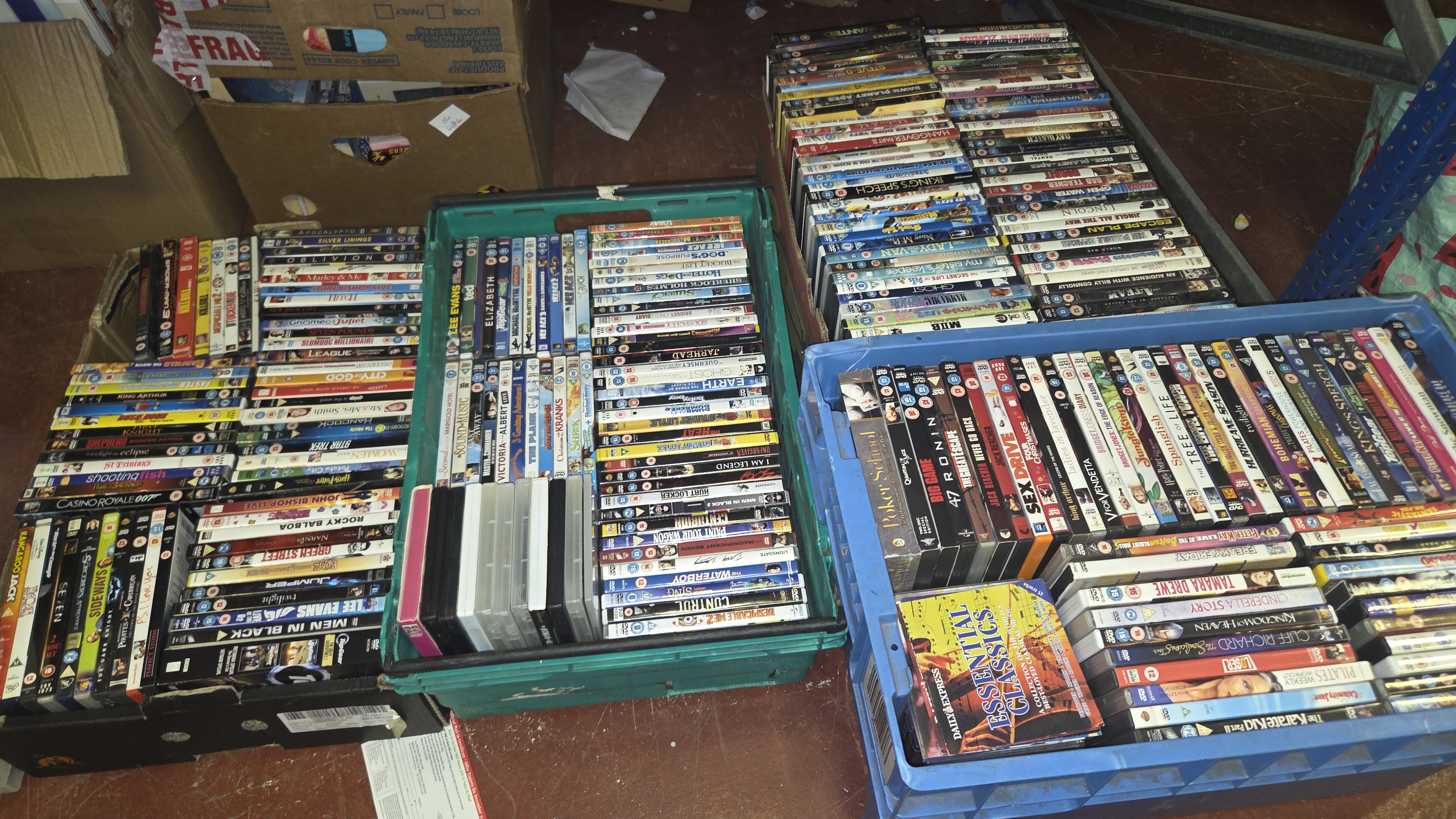 Four Boxes of Assorted DVDs and CDs