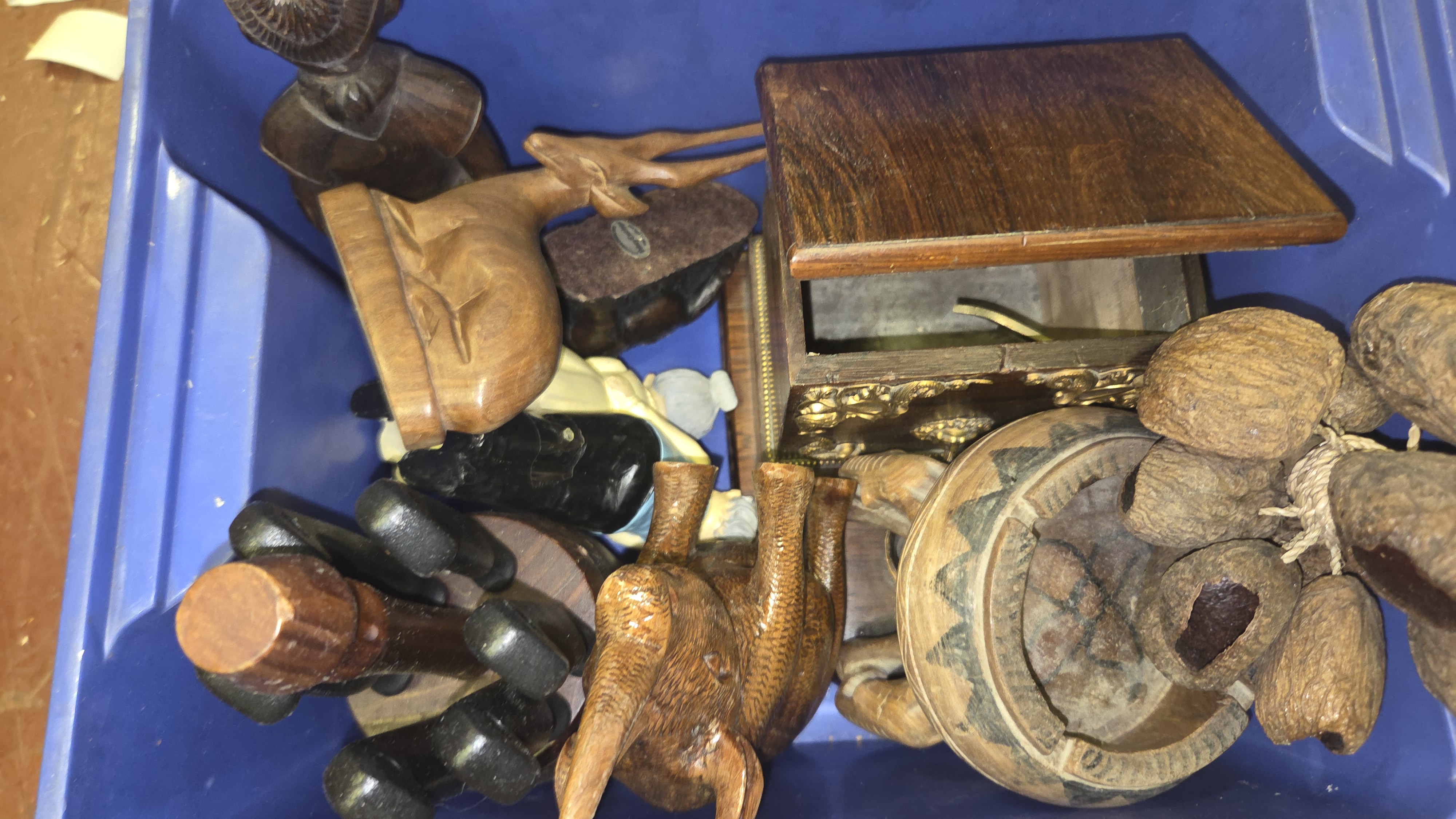 A Collection of Carved Hardwood Ethnic Artifacts and Decorative Treen