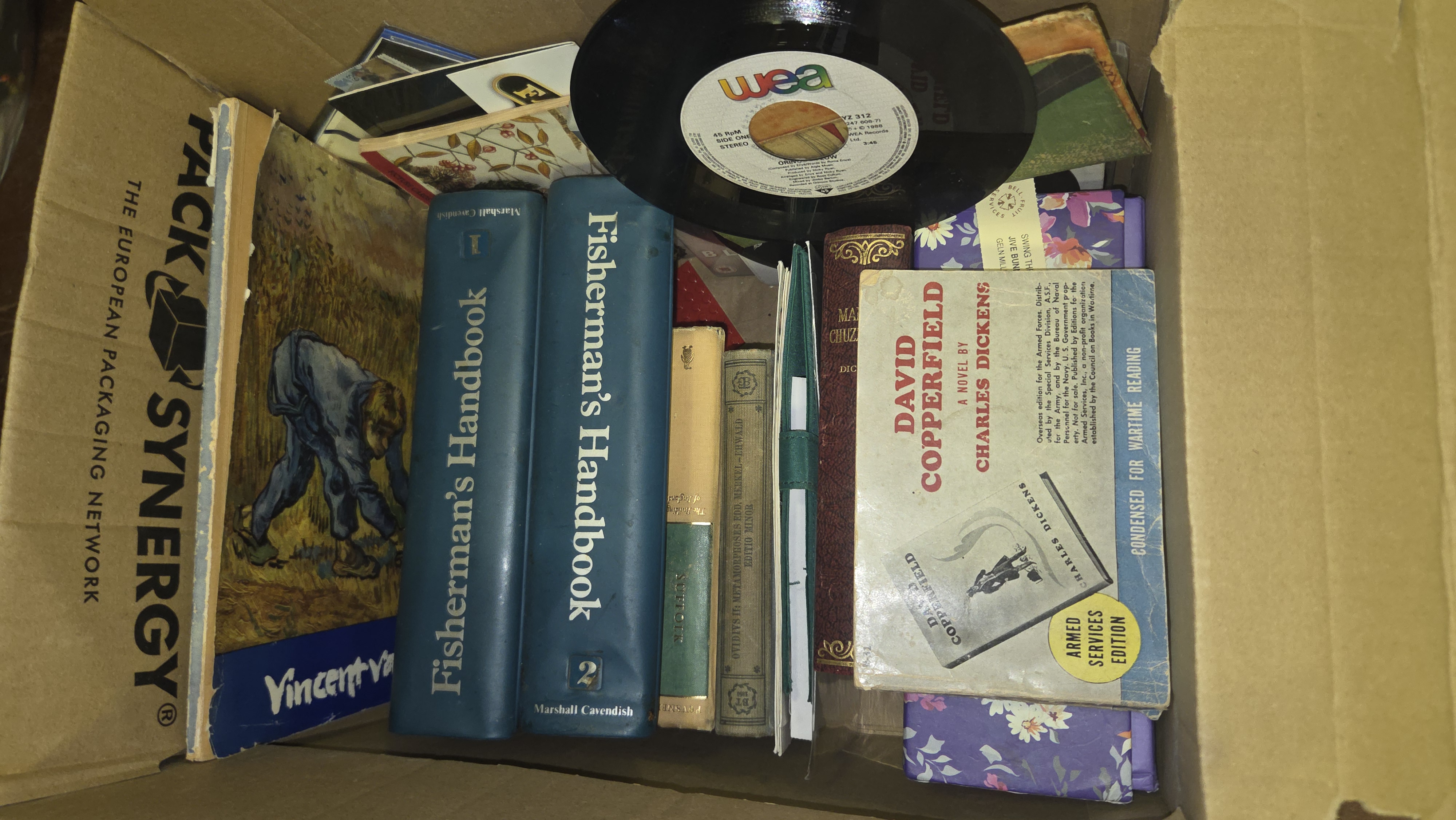 A Collection of Vintage Books, a Vinyl Record, and Ephemera including an Armed Services Edition of David Copperfield