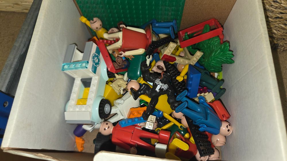 Lot 152 – A Collection of Playmobil Figures, LEGO Building Components, and a Marvel Venom Action Figure
