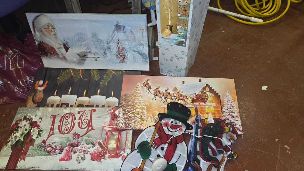 Lot 156 – A Collection of Christmas Canvas Wall Art and Light-Up Decorations
