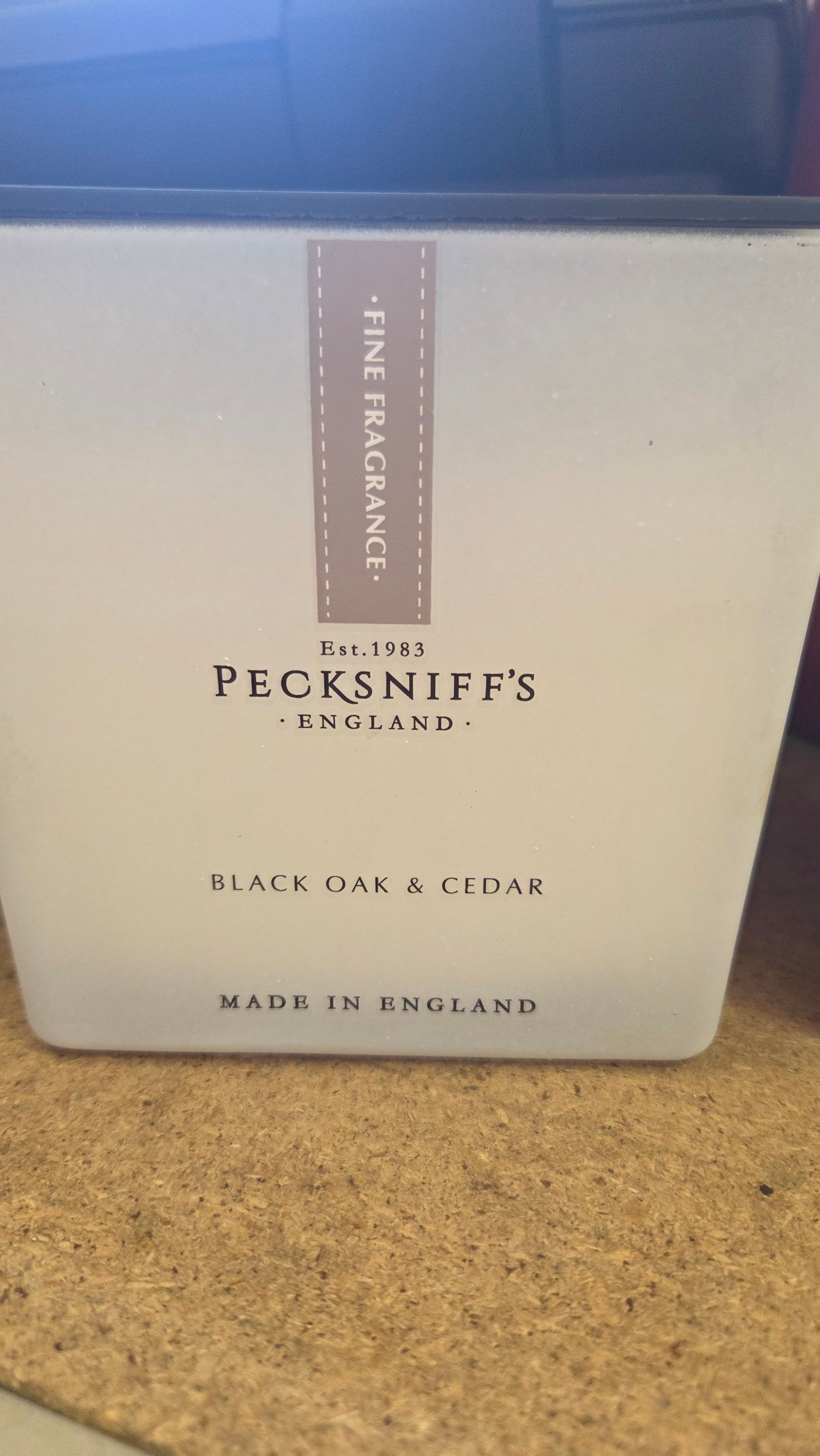 A Pecksniff's England Black Oak and Cedar Frosted Glass Fragrance Candle. 860g - 30.3oz