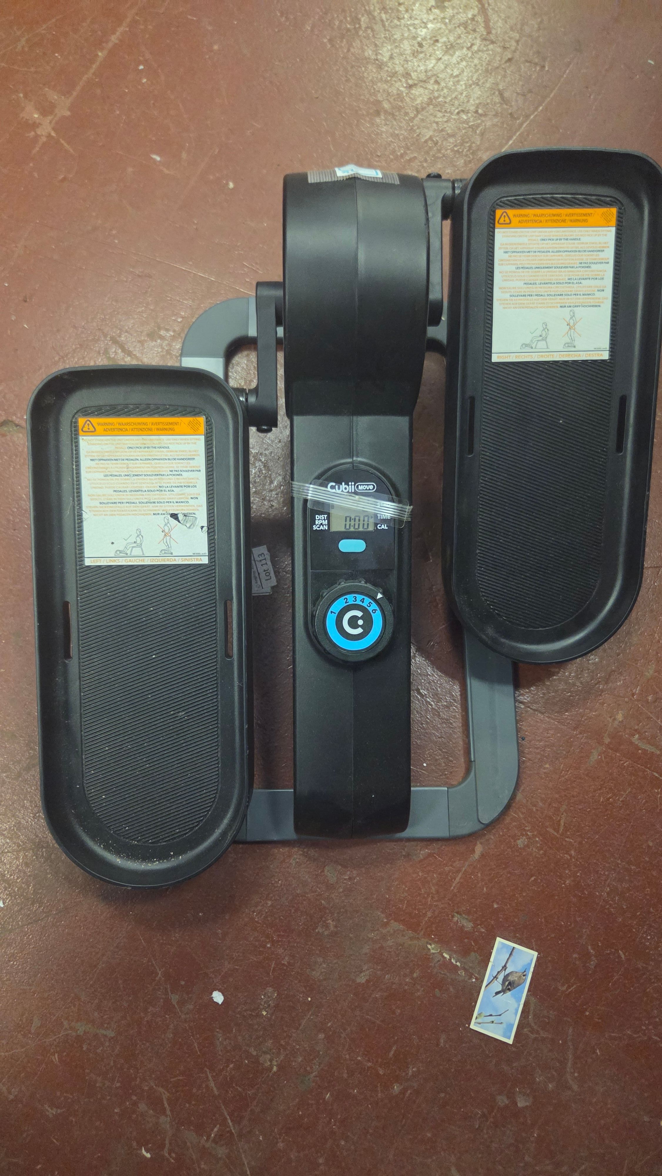 Cubii Move Seated Under Desk Elliptical Pedal Exerciser powers on