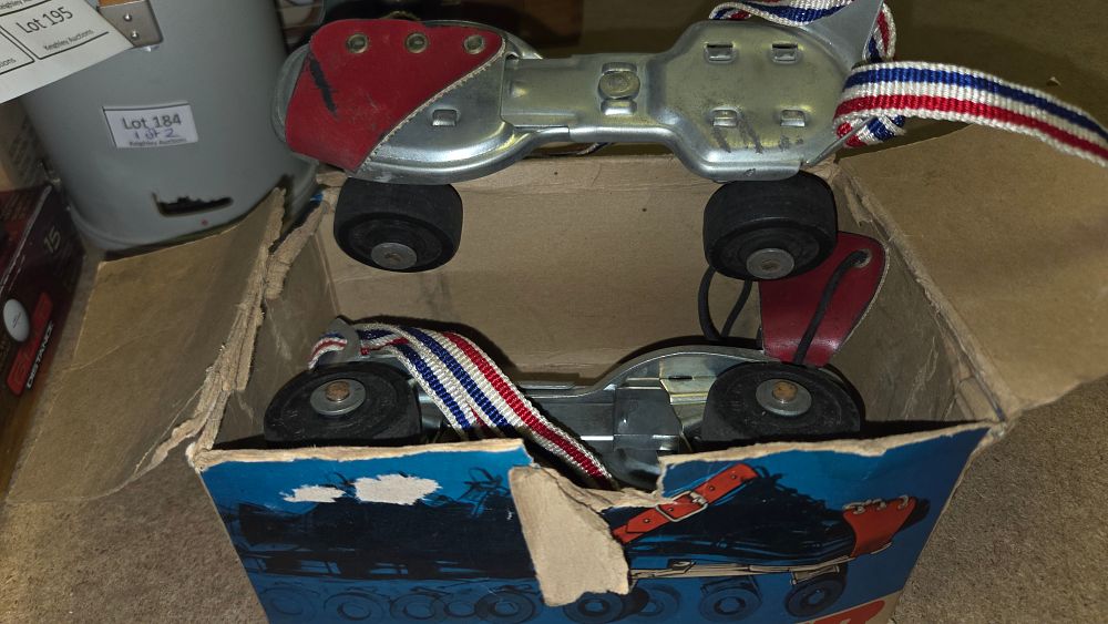 Lot 185 – A Pair of Vintage Warwick Flyer Junior Adjustable Roller Skates with Original Box
