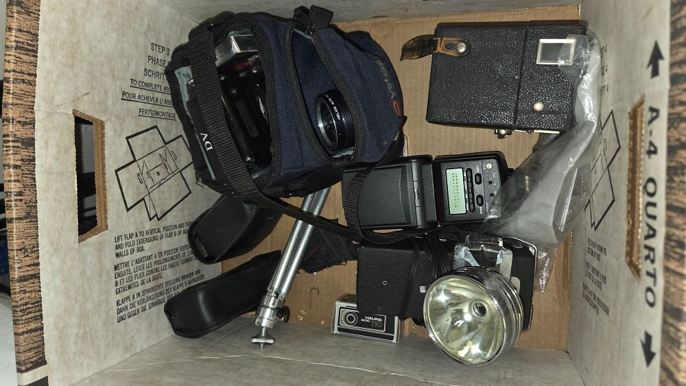Lot 187 – An Assortment of Vintage Photographic Equipment including Halina Micro 110 Camera and Helios 135mm Lens