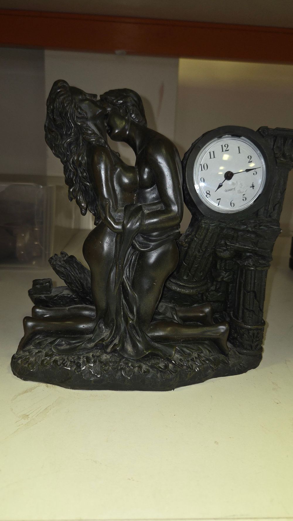 Lot 228 – A Crosa Patinated Resin Figural Mantel Clock Depicting an Embracing Nude Couple