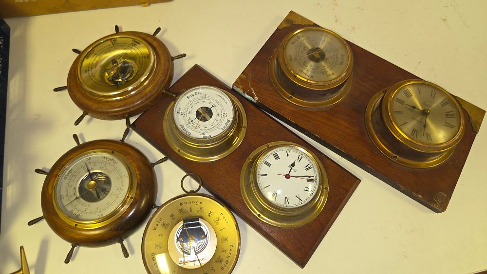 Lot 256 – A Collection of Five Nautical Themed Wooden and Brass Barometers and Clocks
