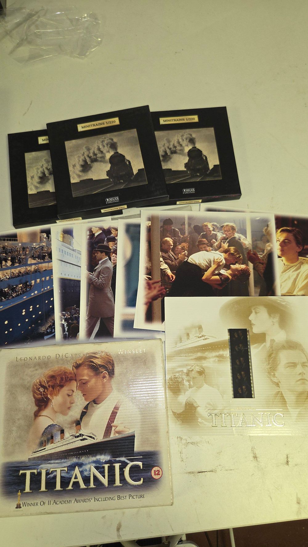 Lot 266 – A Titanic Collector’s Edition Memorabilia Set and a Collection of Atlas Collections Minitrains Folders